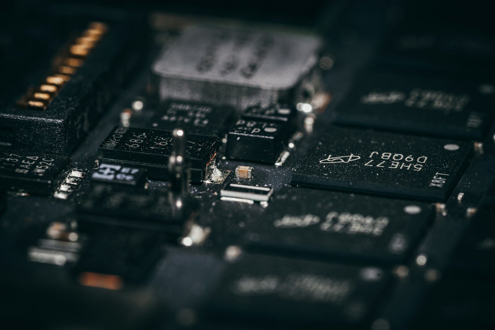 Close-up of a complex electronic circuit board with many components.