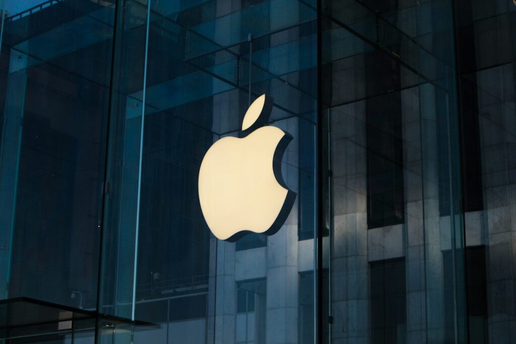 Inside the New Growing Clash Between Apple and EU Regulators apple logo on glass window
