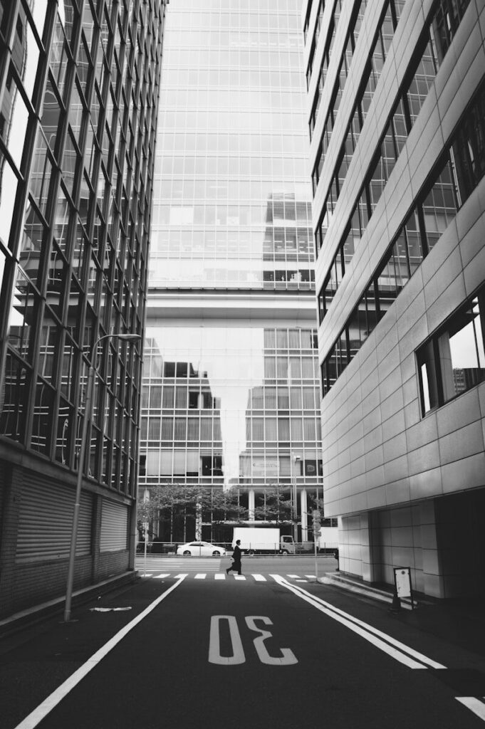 AI Absolutism and the Myth of New Inevitable Future a black and white photo of a city street