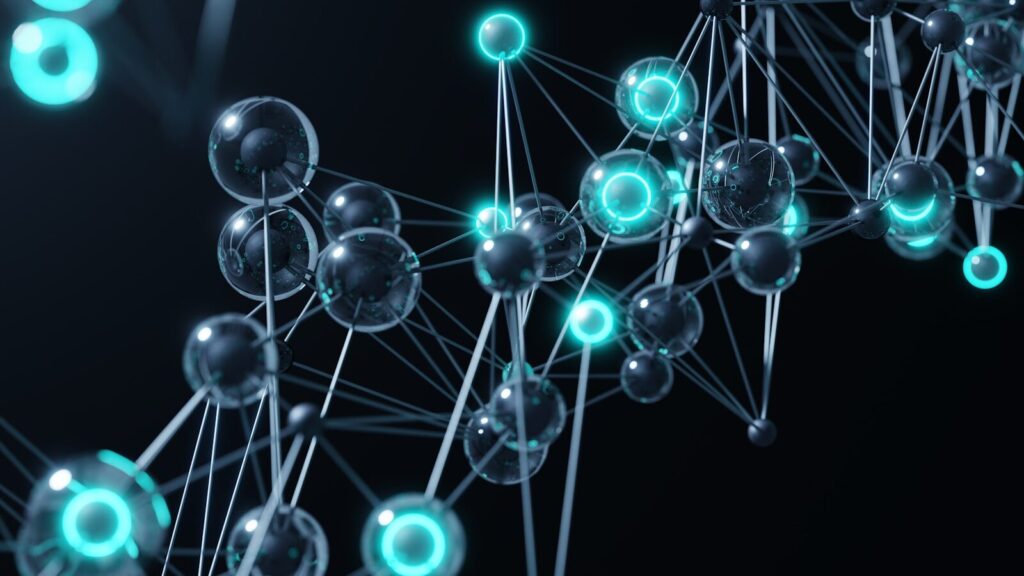 OpenAI’s New Benchmark Reveals How Far AI Go Scientific Research A group of blue and green balls on a black background
