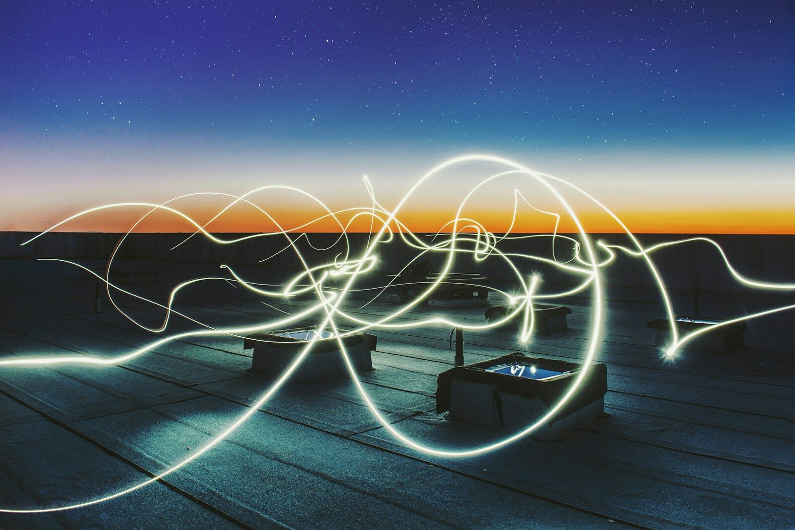 Why New Extreme Weather Exposing Hidden Cost of Artificial Intelligence time lapse photography of square containers at night