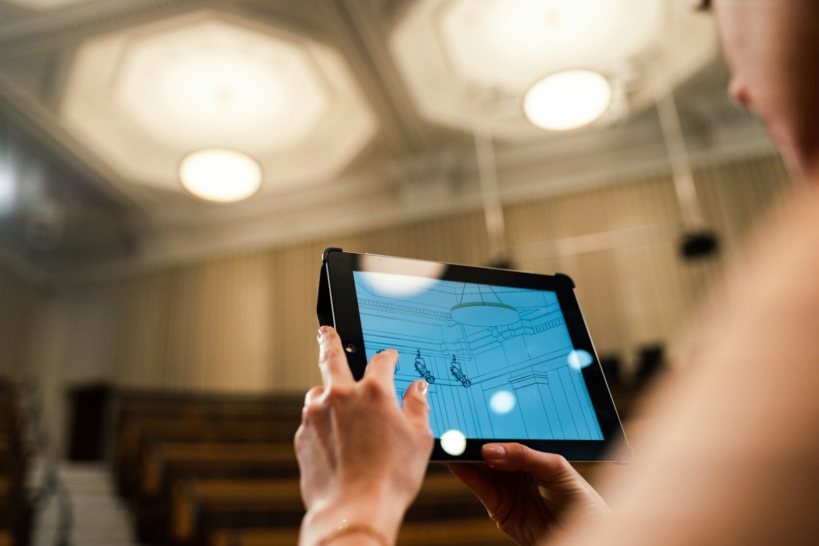 What Landmark Legal Battle Mean for New Future AI Hardware person holding black tablet computer