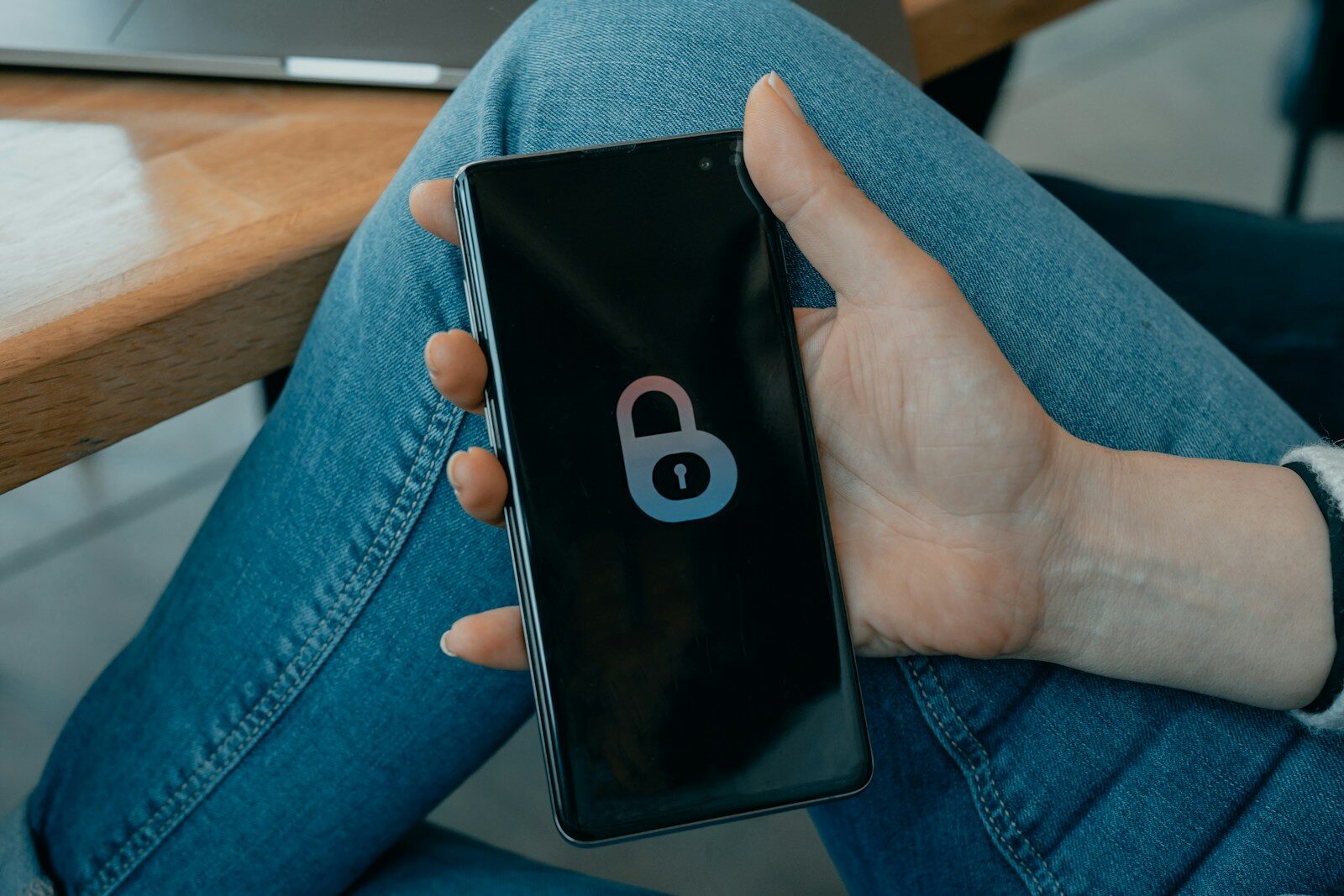 Why Technology Executives Are Facing Rising New Security Concerns black and white smartphone on persons hand