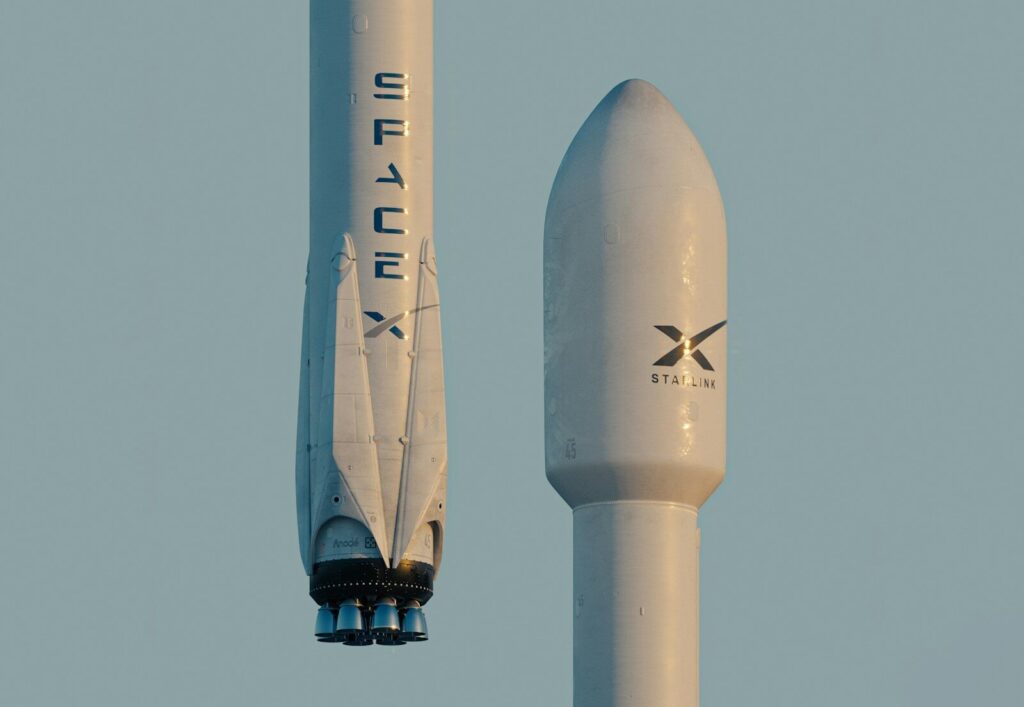 What SpaceX's Prototype Reveals About the New Future AI Hardware a spacex rocket is flying in the sky
