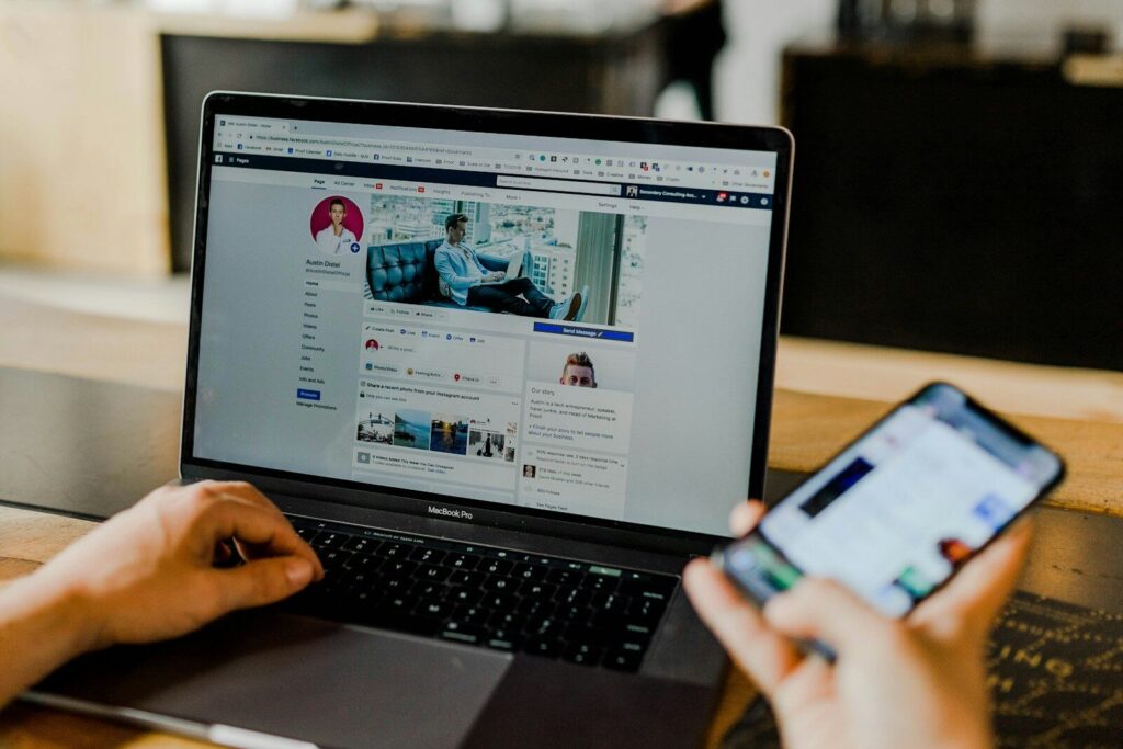 How to Limit the Use of Your Instagram Photos for New AI Training person using both laptop and smartphone